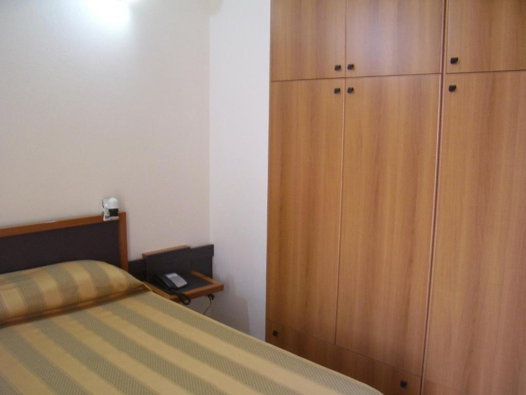 Hotel La Caletta Торре-дей-Корсари Номер фото